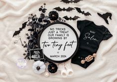 there is a sign that says, no tricks just a treat for growing by the tiny feet