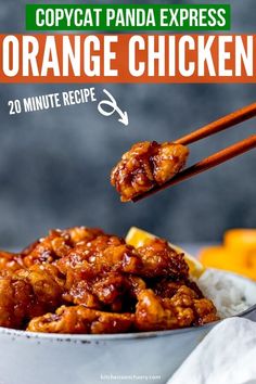 orange chicken with chopsticks in a white bowl