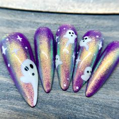 Dawn Witch Designs Unique, re-usable, hand painted, and made in Canada. These luxury press on nails are handmade using high quality gel polish and salon-grade materials.  ✨ A SMALL SPOOK ✨  An adorable spooky Halloween set that features friendly glow in the dark ghosts on a shimmery purple background. *The shape shown in the pictures is the LONG STILETTO *Colours may appear a little different due to your personal monitor settings* ✨ BUY 3 GET 1 PROMOTION ✨ ➜ Buy 3 sets of press on nails and get Purple Fingernails, Cute Spooky Nails, Halloween Nails Cute, Purple Halloween Nails, Glitter Press On Nails, Purple Halloween, Halloween Nail Designs, Nail Sizes, Purple Nails