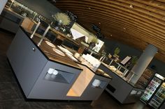 the inside of a restaurant with food on display