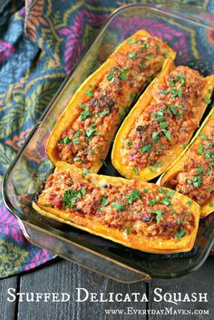 stuffed delicata squash in a glass dish