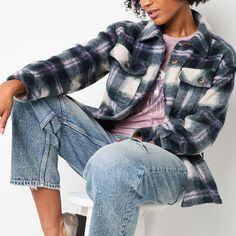 The plaid pattern and cozy texture of this women's shirt jacket from Arizona makes this button-down an easy go-to for your casual looks. Made from soft flannel, it has a point collar, long drop shoulder sleeves and chest flap pockets. Try yours layered over a graphic t-shirt with jeans.Closure Type: ButtonFit: Regular FitPockets: 2 Front Button PocketsSleeve Length: Long SleeveWarmth Factor: MidweightApparel Length: 26.5 InchesOuterwear Length: MidFiber Content: 100% PolyesterFabric Description… Plaid Button-up Shacket With Pockets, Blue Collared Shacket With Buttoned Pockets, Fall Blue Outerwear With Buttoned Pockets, Blue Outerwear With Buttoned Pockets For Fall, Blue Button-up Outerwear With Buttoned Pockets, Plaid Button-up Outerwear With Button Closure, Plaid Button-up Outerwear With Buttoned Pockets, Blue Button-up Outerwear With Pockets, Trendy Button-up Shacket With Patch Pockets