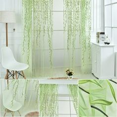 the green curtains are hanging in front of the white chair and table with flowers on it