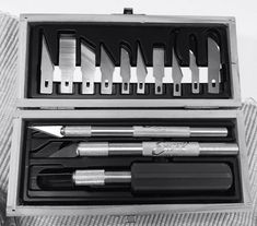 a set of tools in a metal case