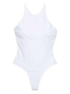 a white one piece swimsuit with plea detailing