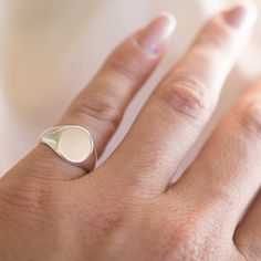 .925 Sterling Silver Round Signet Ring. 9mm x 11mm Perfect for him or for her. Wear on any finger! I like to wear mine on my pinky. Happy to offer custom engraving options. Up to three letters. Please note engraving in the comments at check out. Please see photos for different font options. *For engraving please allow an additional 1 - 3 days for processing* Made in California. Worn everywhere. Anniversary Sterling Silver Tarnish-resistant Dome Ring, Sterling Silver Tarnish-resistant Dome Ring For Anniversary, Silver Tarnish-resistant Round Band Signet Ring, Classic Everyday Nickel Free Rings, Silver Tarnish-resistant Signet Ring, Classic Nickel-free Rings For Everyday Wear, Silver Dome Ring Tarnish Resistant As Gift, Classic Nickel-free Promise Rings, Everyday White Gold Round Signet Ring