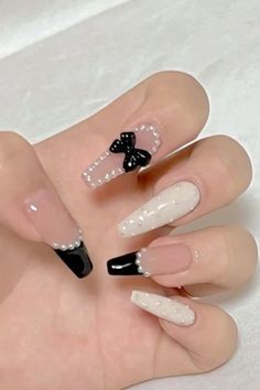 White French Tip Nails With Black Design, Black Nails For Wedding Guest, Bow Nails Black And White, Black And White Pearl Nails, White And Black Prom Nails, Pearl And Black Nails, Black And White Nails Prom, Nails With A Bow Design, Black Nails With Bow Charm