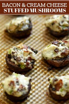 bacon and cream cheese stuffed mushrooms on a baking sheet with text overlay that reads bacon & cream cheese stuffed mushrooms