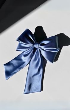 Voda Color: Blue Complete your trendy look with THE PERFECT LONG SATIN HAIR BOW in sleek white. Made with premium silky satin, this stiff double bow is hand-knotted and secured with a french barrette clip. Stand out with this stylish and chic hair accessory that adds the perfect touch to any outfit. Velvet Bow Christmas, Blue Hair Bow, Satin Hair Bow, Blue Hair Bows, Chic Hair, Double Bow, French Barrette, Barrette Clip, Crafty Stuff