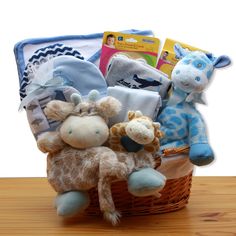 a basket filled with stuffed animals on top of a wooden table