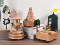 wooden toys are stacked on top of each other in the shape of animals and trees