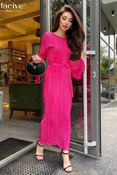 Step into sophistication with our pink pleated maxi dress. Featuring a loose fit, O-neckline, long sleeves, and lace-up details, this ankle-length dress exudes elegance and charm, perfect for special occasions or a chic out. Details: Neckline: O-Neck Silhouette: A-LINE Material: POLYESTER Elasticity: Non Stretch Long Sleeve Pleated Maxi Dress For Brunch, Elegant Pink Maxi Dress For Fall, Feminine Pleated Maxi Dress For Brunch, Pink Pleated Dress For Fall, Elegant Pink Maxi Length Pleated Dress, Fall Pink Pleated Dress, Chic Floor-length Pleated Dress, Elegant Long Sleeve Pink Maxi Dress, Elegant Pink Long Sleeve Maxi Dress