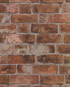 an old brick wall is shown in this image