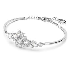 Embrace designs inspired by nature's enchanting beauty. Swarovski's enduring quest for innovation, beauty and excellence is characteristic of their exquisite designs. Take on today's trends with style in a stunning Swarovski Crystal Gema Flower bangle bracelet. -Enjoy free cleaning and inspection at any Day's location for life of this Swarovski Crystal flower bracelet -Bracelet minimum length: 6 1/2" -Bracelet maximum length: 7 7/8" -Bracelet measures 1 5/8" wide -Bracelet features lobster clasp Crystal Wrap Bracelet Swarovski, Touchstone Swarovski Ice Bracelets, Luxury Silver Crystal Bracelet, Swarovski Champagne Swan Bracelet, Cheap Flower-shaped Crystal Bracelet For Women, Luxury Silver Flower Bracelets, Luxury Sterling Silver Crystal Bracelet As Gift, Luxurious Silver Crystal Bracelet, Luxury Adjustable Silver Crystal Bracelet