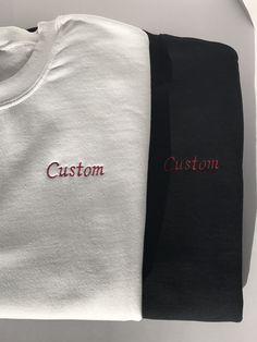 This listing is for a custom embroidered UNISEX crewneck sweatshirt. The more text you add the smaller the text will be. Interested in a different sweatshirt color, thread color, font, etc? Message us on Etsy to make a request. Please see the size chart in the product listing photos to determine the best size for you. Custom embroidered sweatshirts make a gift for any occasion - anniversary, bachelor party, bachelorette party, back to school, birthday, engagement, graduation, sweet 16's and quinceañera's, retirement, and weddings. They're also perfect for any holiday because this sweatshirt is customizable - Valentine's Day, St. Patrick's Day, Easter, Mother's Day, Father's Day, Halloween, Thanksgiving, Hanukkah, Christmas, and more. Or this could be a wonderful treat for yourself. These s Crew Neck T-shirt With Custom Embroidery, Black Embroidered Crew Neck Sweatshirt, Embroidered Logo Long Sleeve Sweatshirt, Embroidered Logo Sweatshirt As A Gift, Long Sleeve Sweatshirt With Embroidered Logo Gift, Black Embroidered Crew Sweatshirt, White Sweatshirt With Letter Embroidery As Gift, White Crew Neck Sweatshirt With Letter Embroidery, Black Embroidered Text Sweatshirt Crew Neck