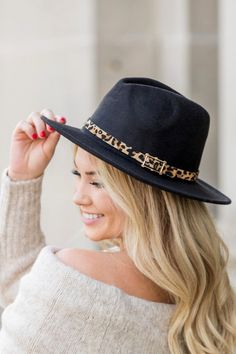 Complete all your fall and winter looks with our trendy leopard buckle accent fedora hat! 65% Cotton/35% polyester leopard buckle accent. Circumference: 22" Brim length: 2.75" Height: 4.75" cap Tassel Keyring, Military Hat, Black Baseball Cap, Boutique Fashion, Knit Beanie Hat, Vintage Harley, Black Hat, Wide Brimmed Hats, Red Hats