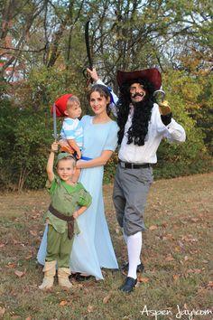 a family dressed up as peter panton and the little prince with their son jack sparrow