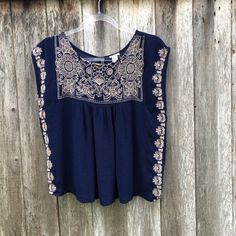 Nwt Forever 21 Embroidered Boho Navy Short Sleeve Top Size: Medium Condition: New With Tags, Nwt Fast Shipper, Happy To Provide Measurements, Offers Are Always Welcome. Thank You! :) Boho, Bohemian, Festival, Embroidered Spring, Summer B7 Fmb Forever 21 Floral Embroidery Fitted Tops, Casual Embroidered Tops From Forever 21, Blue Summer Top With Intricate Embroidery, Navy Short Sleeve Tops, Green Sleeveless Blouse, Green Floral Blouse, Business Casual Top, White Blouse Top, Bohemian Festival