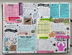 an open notebook with stickers and writing on the pages, including words that spell out things