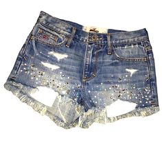 Size 00 Hollister Shorts Are New Without Tags These Were Difficult To Photograph And Do Not Show How Pretty The Rhinestone Detailing Is. Model Is 5’3 110 Lbs 110 Lbs, Hollister Shorts, Shorts Denim, Blue Jean Shorts, Blue Jean, Crystal Rhinestone, Hollister, Blue Jeans, Jean Shorts