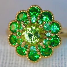 Yellow Mali Garnent Ring. With neon green tsavorite garnet. Set in 14K yellow Gold. A beautiful and unique neon yellow garnet ring, created in double halo hydrangea settings to create a luxurious and high-quality piece of jewelry, perfect to express your love. 💎 PREMIUM RING -- A brand new garnet ring, personally designed and made with the highest quality of 14K yellow gold. It is designed ✨ CLASSIC BRILLIANCE -- Designed with a beautiful neon yellow mali garnet at the center and neon green tsa Oval Multi-stone Emerald Ring, Green Multi-stone Emerald Rings, Fine Jewelry Green Multi-stone Emerald Ring, Green Multi-stone Emerald Ring Fine Jewelry, Lime Green Fine Jewelry With Center Stone, Peridot Multi-stone Rings For May Birthstone, Oval Green Multi-stone Gemstones, Green Oval Multi-stone Gemstones, Green Center Stone Fine Jewelry Gemstones