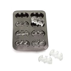 the batman cookie mold is ready to be made into some kind of cupcake pan