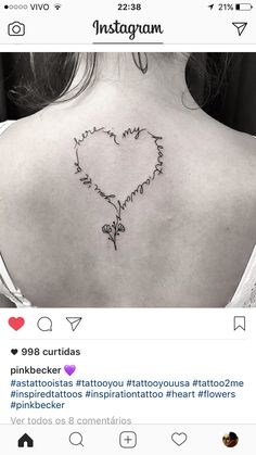 the back of a woman's neck with an instagram message written on it