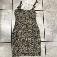 All Over Leopard Print Bodycon Dress With Self Tie Cami Straps Material: 97% Polyester | 3% Spandex Measurements: 34" Length Free Shipping For Most Bundles With Multiple Items Low Ball Offers Will Be Declined Fitted Leopard Print Mini Dress For Brunch, Casual Leopard Print Mini Dress For Date Night, Brown Fitted Mini Sundress, Fitted Brown Mini Sundress, Casual Stretch Leopard Print Mini Dress, Casual Leopard Print Mini Bodycon Dress, Summer Leopard Print Mini Bodycon Dress, Red Sequin Mini Dress, Sequin Shirt Dress