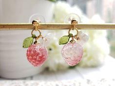 "pink glass strawberry drop earrings with cute white flower and green leaf Material: glass strawberry, acrylic leaf and flower, gold plated stud or hook drop length: about 1.5\" Contains small parts. Use caution when giving to young children less than Age 3 Please keep them away from moisture. If you have any questions, please feel free to contact me. Thanks :)" Trendy Pink Fruit Design Earrings, Pink Strawberry Print Earrings For Gift, Pink Strawberry Print Earrings As Gift, Cute Pink Jewelry With Strawberry Print, Cute Pink Strawberry Print Jewelry, Strawberry Drop, Earrings Food, Strawberry Earrings, Peach Earrings