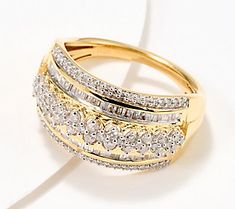 a gold ring with three rows of diamonds on the top and bottom, set against a white background