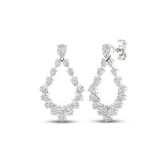 Sparkling pear-shaped diamonds graduate down a teardrop design on these gorgeous dangle earrings for her. A pear-shaped diamond shimmers at the post for a total diamond weight of 2 carats. Fashioned in 14K white gold, the earrings secure with friction backs. Teardrop Dangle Earrings, Diamond Hoop Earrings, Pear Shaped Diamond, Gold Price, Accessories Jewelry Earrings, Earring Backs, Designer Earrings, Pear Shaped, Fashion Earrings