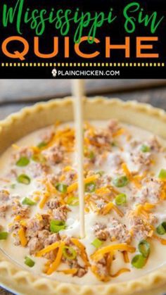 a pie with cheese, meat and green peppers on it is being cut into slices