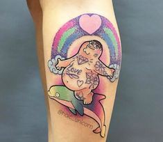 a woman's leg with a tattoo on it that reads, love and unicorn