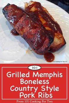 grilled memphis boneless country style pork ribs on a plate with bbq sauce