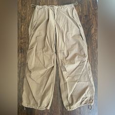 Urban Outfitters Parachute Pants, Never Worn, Adjustable Waist And Ankle Urban Outfitters Cargo Pants With Pockets For Spring, Spring Cargo Pants From Urban Outfitters, Urban Outfitters Spring Cargo Pants With Pockets, Urban Outfitters Wide Leg Cargo Pants, Urban Outfitters Wide-leg Cargo Pants, Urban Outfitters Wide Leg Cargo Pants With Pockets, Urban Outfitters Spring Bottoms With Cargo Pockets, Urban Outfitters Wide-leg Cargo Pants With Pockets, Urban Outfitters Spring Cargo Bottoms