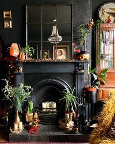 a living room filled with furniture and a fire place in front of a mantle covered in plants