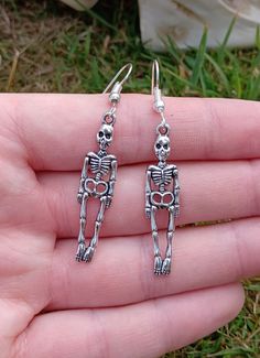 Silver plated earring hooks with skeleton charms 💀 Bone Colored Metal Earrings For Pierced Ears, Skull-shaped Metal Earrings, Nickel-free Bone Dangle Earrings, Nickel Free Metal Skull Earrings, Skull Shaped Metal Earrings For Gifts, Skull-shaped Metal Earrings With Ear Wire, Metal Skull Earrings With Ear Wire, Metal Skull Single Earring, Silver Skull Earrings With Ear Wire