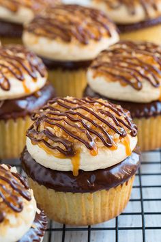 cupcakes with chocolate frosting and caramel drizzled on top