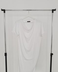 "Men's cowl neck t-shirt with short sleeves,partly with a raw hem finish and with a \"twisted\" and curved \"banana\" like pattern for an dramatic drape like fit. The jersey blend of this top is very fine and due to the white color it has some very soft and partly sheer effect. This twisted cowl neck t-shirt is a statement top for nice spring days or amazing summer nights. (Pictures on a model will follow up once I'm able to finish sewing the new summer collection) Please keep in mind that I can Casual Summer Top With Cowl Neck, Casual Cowl Neck Top For Summer, Summer Casual Cowl Neck Top, White Stretch Modern T-shirt, Casual Cowl Neck Top, Futuristic Top, Minimalist White, Tee Shirt Homme, Cowl Neck Top