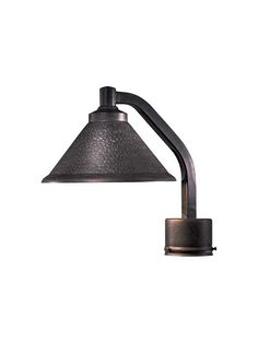 an industrial style wall light with a metal shade