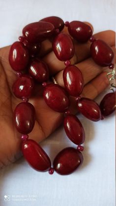 Supernatural 624 Ct Fine Quality Ruby Smooth oval Gemstone Necklace Stone : Ruby dyed Shape :- Smooth oval Necklace - 18 inch Size :- 16x22mm to 15x26mm Weight :- 624 carat Polish :- Handmade color - Red makes a great gift for your loved ones. Click below to see live stock: https://www.etsy.com/au/shop/ShakugemsStore?ref=search_shop_redirect If for any reason you are not satisfied with your purchase. You can return it for a full refund within 5 days (If you want maximum or minimum quantity of th Oval Single Strand Beaded Necklace As Gift, Oval Single Strand Beaded Necklace For Gift, Traditional Oval Necklaces With Polished Beads, Oval Gemstone Beads For Jewelry Making, Oval Gemstone Beaded Necklaces For Jewelry Making, Red Oval Gemstone Beads Jewelry, Red Oval Gemstone Bead Jewelry, Polished Oval Beads Gems And Cabochons For Gift, Red Gemstone Necklace With Oval Beads