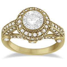 a white diamond engagement ring with two rows of diamonds on the band and an oval center stone