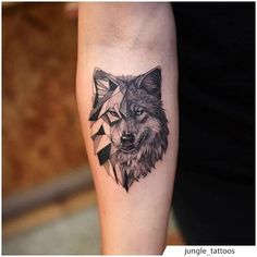 a wolf tattoo on the left arm