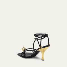 Bottega Veneta "Adam" braided leather sandals with golden apple accent 3.50 in / 90 mm metallic architectural heel Thong strap Strappy vamp Adjustable ankle ties Leather/Rubber outsole Lining: Leather Made in Italy Party Heels With Braided Straps, Braided Leather Sandals, Golden Apple, Ankle Wrap Sandals, Wrap Sandals, Braided Leather, Bottega Veneta, Leather Sandals, Tops Designs