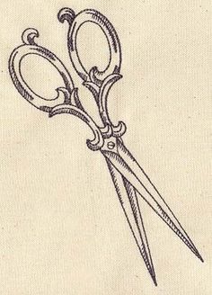 a pair of scissors sitting on top of a piece of paper next to each other