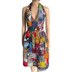 Handmade Summer Patchwork Dress using Cotton African Print Fabric . Available  in size Large only in this particular pattern. Check out our other listing for different designs and sizes. This African Print Patchwork Dress is not  lined on the bottom part and has  no pockets . If you have any questions please leave me a messages.thank you. Multicolor Cotton Halter Neck Dress, Fitted Sleeveless Patchwork Midi Dress, Multicolor Sleeveless Patchwork Midi Dress, Multicolor Mixed Print Sleeveless Dress, Sleeveless Multicolor Patchwork Midi Dress, Multicolor Patchwork Sleeveless Midi Dress, Multicolor Sleeveless Dress With Mixed Print, Multicolor Patchwork Sundress, Bohemian Fitted Multicolor Halter Dress