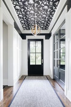 Black And White Hallway, White Entryway, White Hallway, Wallpaper Ceiling, Entrance Foyer, Entry Hallway, White Chandelier