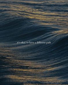 an ocean wave with the words it's okay to have a different path