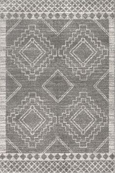 a gray and white rug with diamond shapes