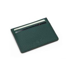 Crafted from pebble pattern calf skin, this card holder for men exudes elegance and durability. The rich green color adds a touch of sophistication, making it a stylish accessory for any modern man.   Key Features:     Material:  Pebble pattern calf skin   Color:  Green   Size:  10 x 7.3 cm   Structure:  4 credit card slots and one top pocket   With four credit card slots and a top pocket, this card holder offers ample space for your essential cards while maintaining a sleek and compact design. Luxury Green Wallets With Rfid Blocking, Green Luxury Card Holder With Interior Slots, Luxury Green Wallet With Rfid Blocking, Modern Green Wallets With Rfid Blocking, Green Bifold Card Holder With Interior Slots, Elegant Green Bifold Card Holder, Elegant Green Rectangular Card Holder, Modern Green Bifold Card Holder, Green Leather Card Holder With Rfid Blocking